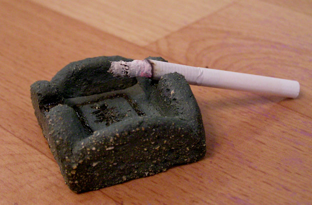 Ashtray/Brush holder
---------
 (  ,      )